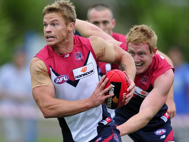 Colin Sylvia bursts out of the centre in an intra-club game.