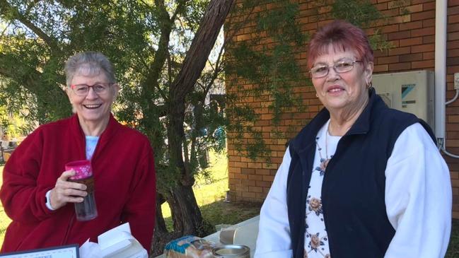 Patricia serving at the church's markets with Nancy Cowin.