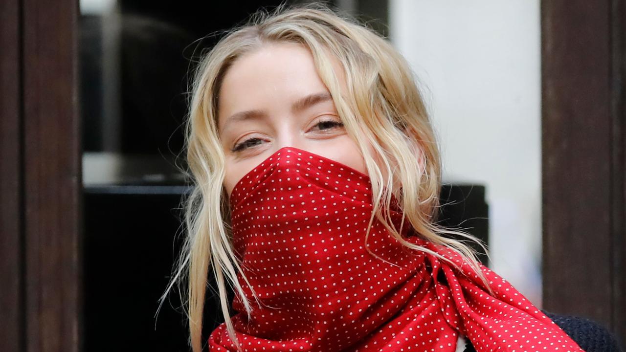 US actress Amber Heard arrives on day nine of the libel trial by her former husband US actor Johnny Depp against News Group Newspapers (NGN), at the High Court in London, on July 17, 2020. (Photo by Tolga AKMEN / AFP)