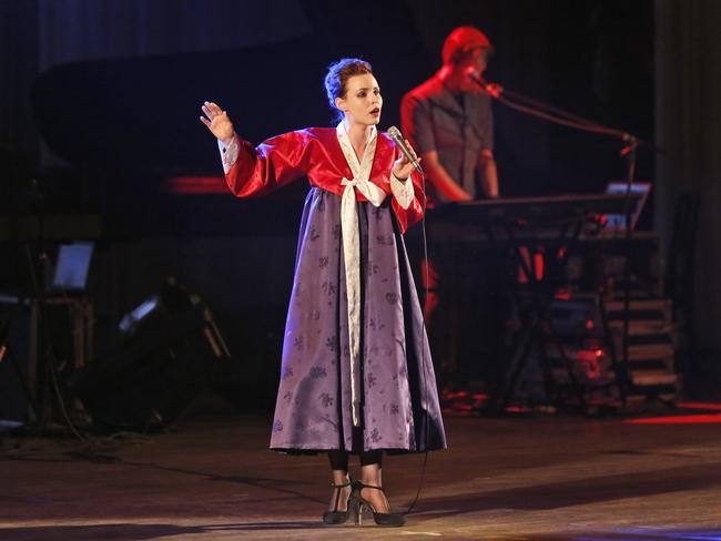 Singer ... a member of Slovenian rock band Laibach wears a traditional Korean dress as she performs in Pyongyang, North Korea. Picture: AP Photo/Dita Alangkara