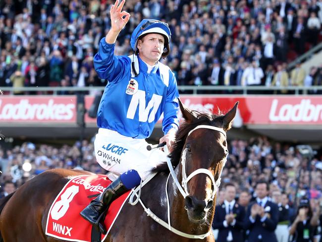 Hugh Bowman and Winx after their amazing achievement.