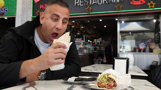 Rob Shehadie taste-testing the kebabs at New Star Kebabs. Picture: Jonathan Ng