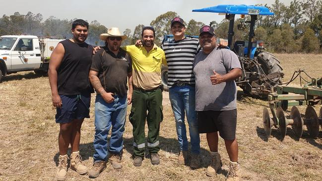 Latrell Mitchell (second from right) with family and friends helping out with the fires in Taree. Picture: Facebook