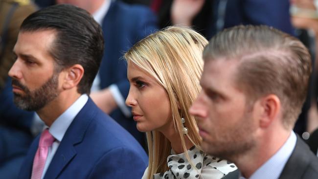 Donald Trump Junior, Ivanka Trump and Eric Trump listen to Donald Trump give a joint press conference at the Foreign and Commonwealth office in London. Picture: AFP.