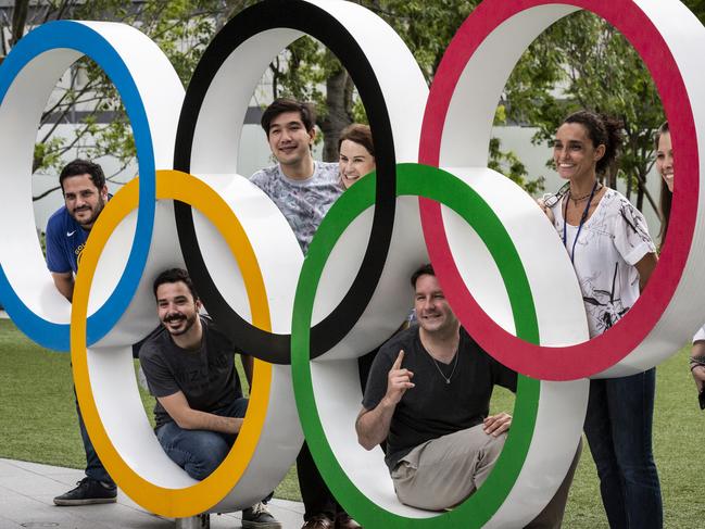 TOKYO, JAPAN - JUNE 03: People have their photographs taken next to the Olympic Rings on June 03, 2021 in Tokyo, Japan. Tokyo 2020 president Seiko Hashimoto has stated that she is 100 percent certain that the Olympics will go ahead despite widespread public opposition as Japan grapples with a fourth wave of coronavirus. The Japanese organising committee also announced yesterday that around 10,000 of the 80,000 volunteers originally scheduled to help at the Games have withdrawn as concern continues to surround the countryÃ¢â¬â¢s ability to hold a huge sporting event amid a global pandemic. (Photo by Yuichi Yamazaki/Getty Images)