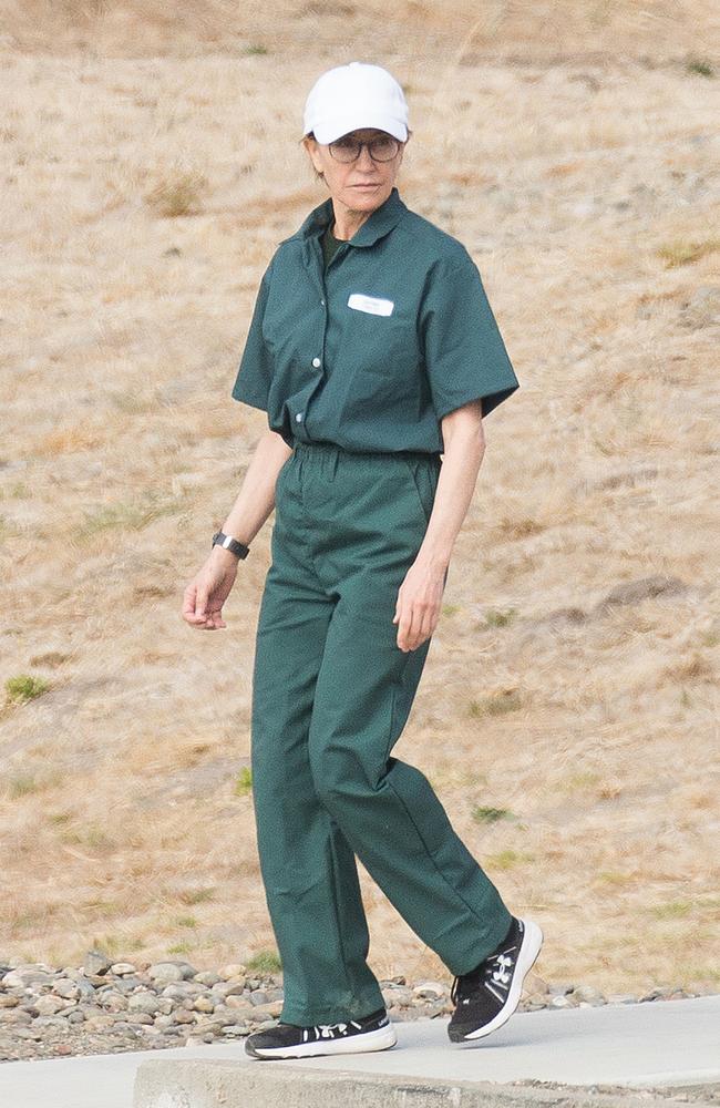 Felicity Huffman wears a prison jumpsuit while serving out her sentence on federal charges. Picture: SplashNews.com