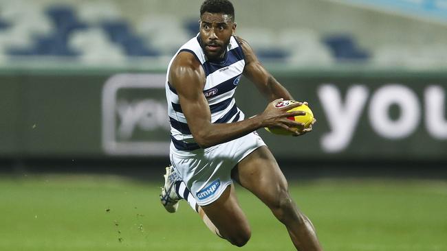 GEELONG, AUSTRALIA – JUNE 20: Esava Ratugolea of the Cats runs with the ball during the round 3 AFL match between the Geelong Cats and the Carlton Blues at GMHBA Stadium on June 20, 2020 in Geelong, Australia. (Photo by Daniel Pockett/Getty Images)