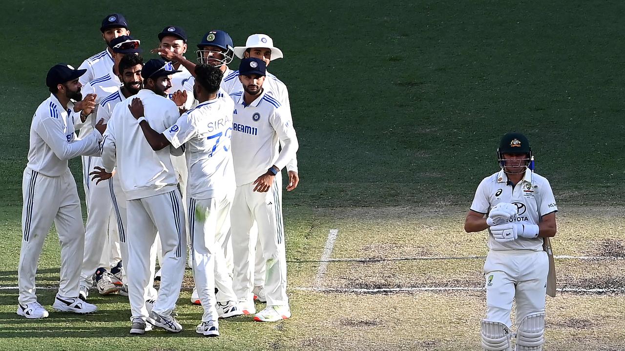 India’s paceman Jasprit Bumrah (L) celebrates his wicket of Australia's Marnus Labuschagne (R) with teammates during day three of the first Test cricket match between Australia and India at Optus Stadium in Perth on November 24, 2024. (Photo by SAEED KHAN / AFP)