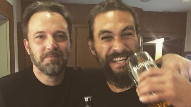 Aquaman star Jason Momoa (right) and his Justice League co-star Ben Affleck (Batman). Momoa is heading to the Coast to star in DC Comics’ stand-alone Aquaman spin-off.