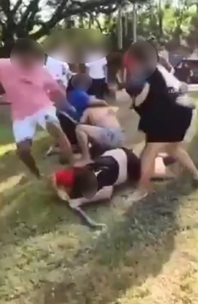 Footage has emerged of a brawl involving a large group of people at Apex Park on Sunday. Picture: Facebook