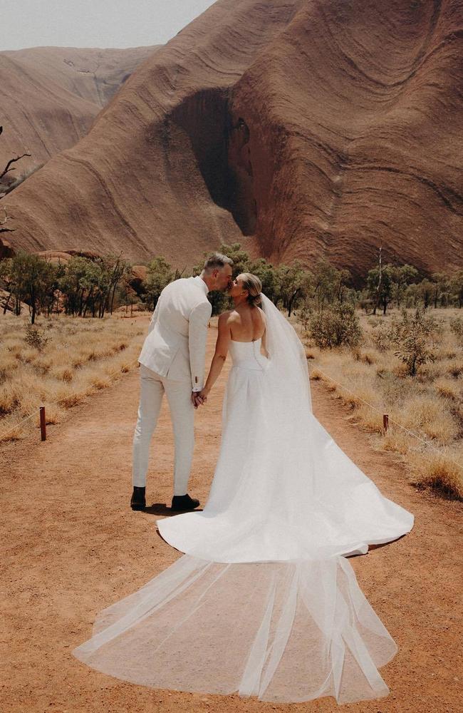 The married couple at their picturesque ceremony. Picture: Instagram @abbeycholmes