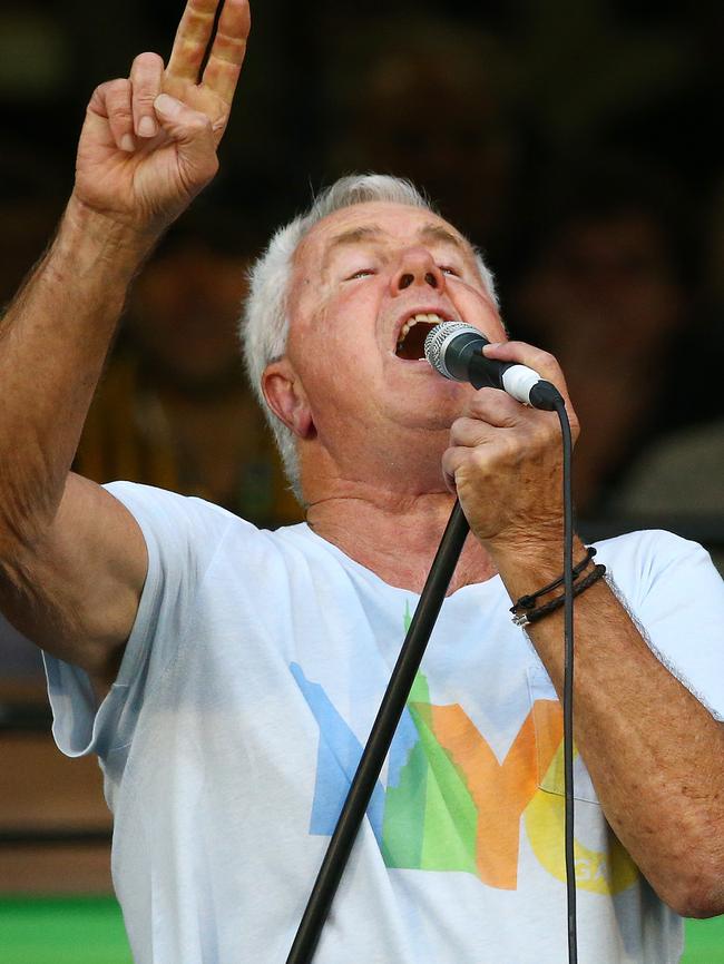 Daryl Braithwaite sings at a AFL game in Melbourne. Picture: George Salpigtidis