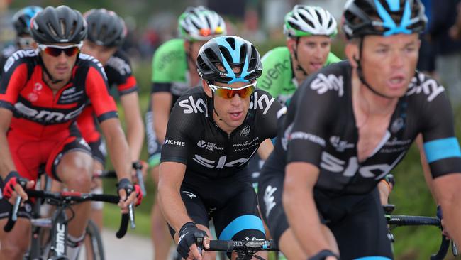 Team Sky rider Richie Porte, centre, follows teammate Vasil Kiryienka on the climb of the Col d'Oderen during the Tour de France.