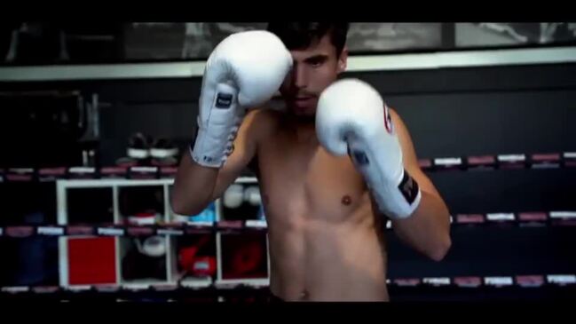 Premium Photo  Portrait of muscular boxer who training and practicing left  hook in red gloves on white background