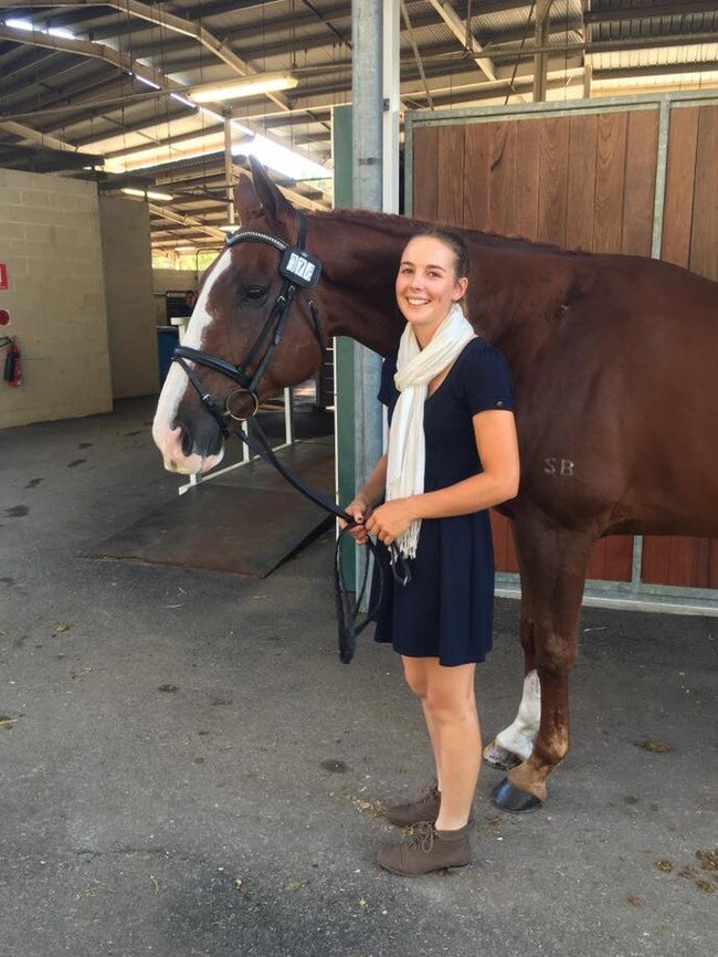 Caitlyn with her horse Ralphie.