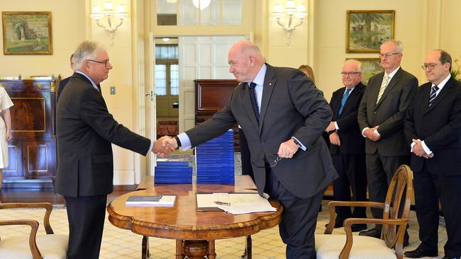 Commissioner Justice Peter McClellan and Governor-General Sir Peter Cosgrove at the signing ceremony and the release of the final report of the Royal Commission into Institutional Responses to Child Sexual Abuse. Picture: Jeremy Piper.