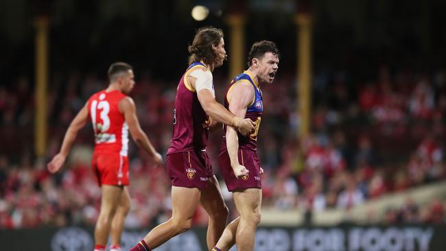 Lachie Neale (right) is enjoying his football this season. Picture: Matt King/AFL Photos/via Getty Images