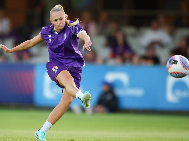 PERTH, AUSTRALIA - MARCH 08: Millie Farrow of the Glory shoots for goal as she warm's up during the A-League Women round 19 match between Perth Glory and Wellington Phoenix at Macedonia Park, on March 08, 2024, in Perth, Australia. (Photo by James Worsfold/Getty Images)