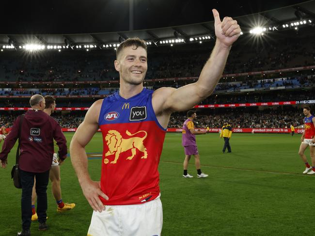 MELBOURNE, AUSTRALIA - SEPTEMBER 21: Josh Dunkley of the Lions acknowledges the fans after the AFL Preliminary Final match between Geelong Cats and Brisbane Lions at Melbourne Cricket Ground, on September 21, 2024, in Melbourne, Australia. (Photo by Darrian Traynor/AFL Photos/via Getty Images)