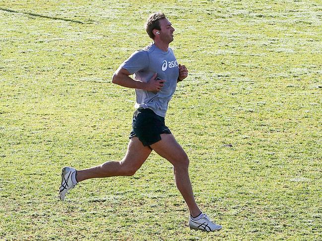 Adelaide Crows player, Daniel Talia exercising on Unley Oval on Wednesday. Picture: Sarah Reed