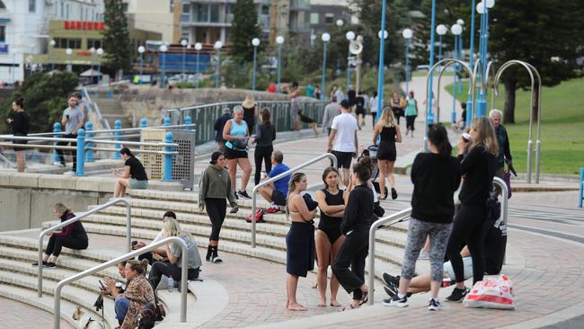 Crowds gather at Coogee Beach on Tuesday morning. Picture: Rohan Kelly