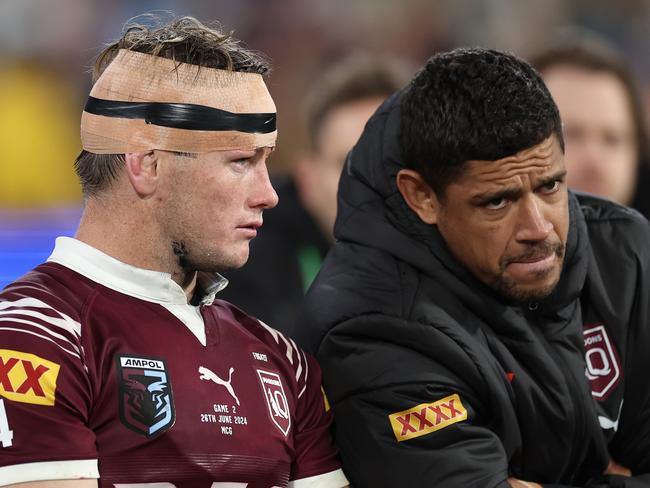 Harry Grant and Dane Gagai of the Maroons look on from the bench during Origin II. Picture: Getty Images