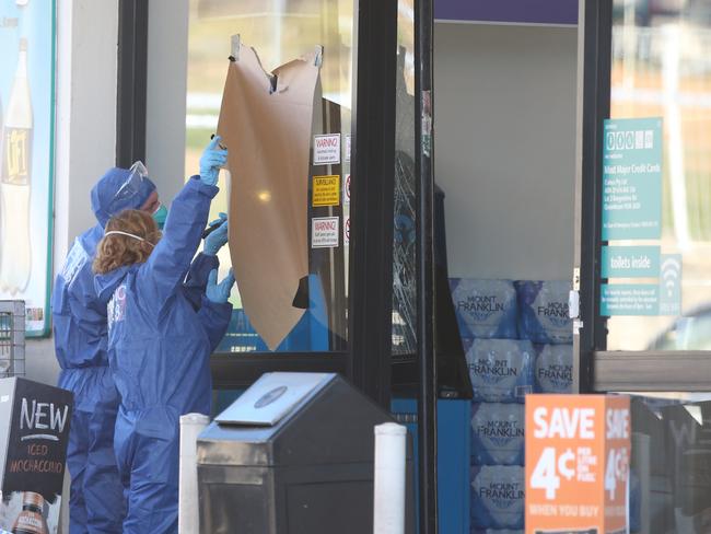 The letters “IS” were scrawled in blood at the scene. Picture Kym Smith
