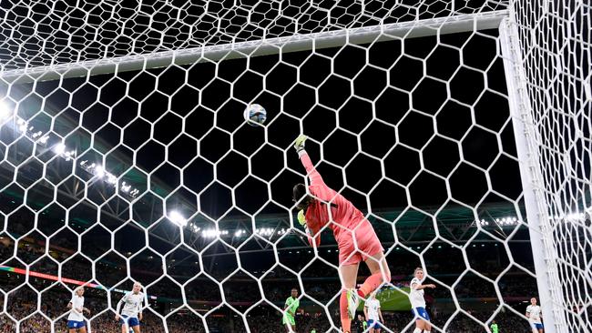 England’s Mary Earps dives as Ashleigh Plumptre’s shot hits the crossbar. Picture: Getty