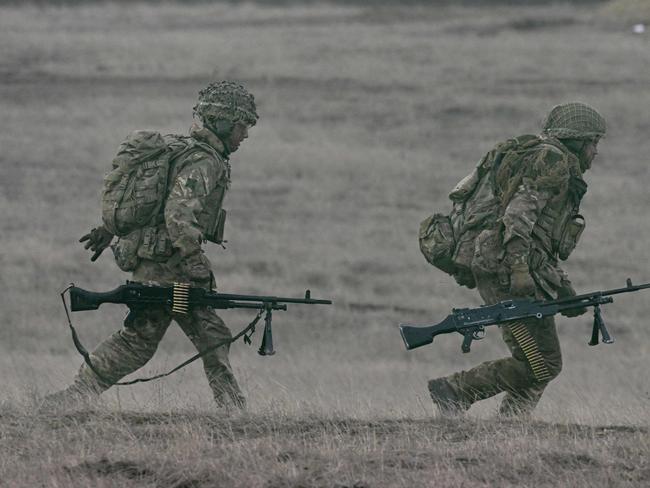 NATO military forces participate in the âExercise Steadfast Dart 2025â at the Smardan Training Area in Smardan, south-eastern Romania, on February 19, 2025. The exercise is the first large-scale deployment of the ARF since its establishment past year and is aimed to test the deployable capabilities and procedures as well as the interoperability among the troop contributors and host nations. The exercise is set to demonstrate0 NATOâs ability to rapidly deploy forces from Europe to reinforce the defence of its eastern flank. This reinforcement will occur during a simulated emerging conflict scenario with a near-peer adversary, showing the ARF capability to conduct and sustain complex operations across thousands of kilometers and in any condition. Approximately 10.000 personnel from 9 Allies and including air, land, maritime and special operation forces will participate. STDT25 will be carried out in Romania, Bulgaria and Greece with the host nations' support to demonstrate NATOâs responsiveness in delivering significant deterrence effects. Live capability demonstrations will be conducted including amphibious operations, live-fire air power and combined maneuvers across all domains. (Photo by Daniel MIHAILESCU / AFP)