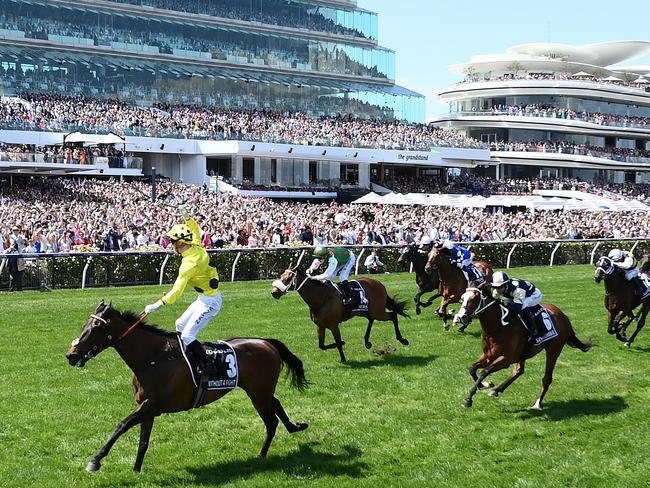 MELBOURNE, AUSTRALIA - NOVEMBER 07: Mark Zahra riding Without a Fight wins the Lexus Melbourne Cup during Melbourne Cup Day at Flemington Racecourse on November 07, 2023 in Melbourne, Australia. (Photo by Quinn Rooney/Getty Images)