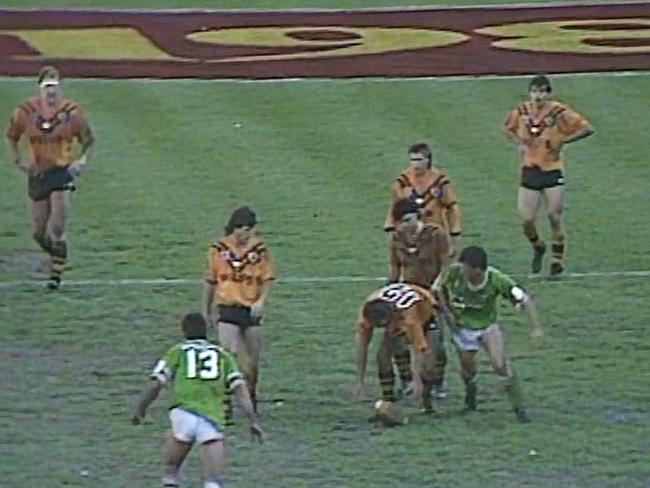 1989 NRL Grand Final: Balmain's Bruce McGuire plays the ball forward to run again because Canberra's Steve Walters was to the side of him not in front of him as a marker.