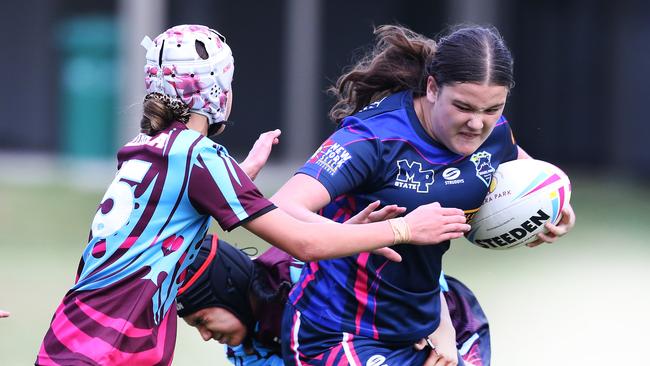 Titans Schools League at Burleigh Bears Junior Rugby League. Year 7/8 Division 1 girls:Keebra Park v Mabel Park .Mabel Parks Tupoutua King on the charge.. Picture Glenn Hampson