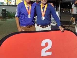 SILVER SMILES: Kim McCasker and Greg Wallace after winning a silver medal in the Pan Pacific Masters Games  on the Gold Coast. Picture: Contributed