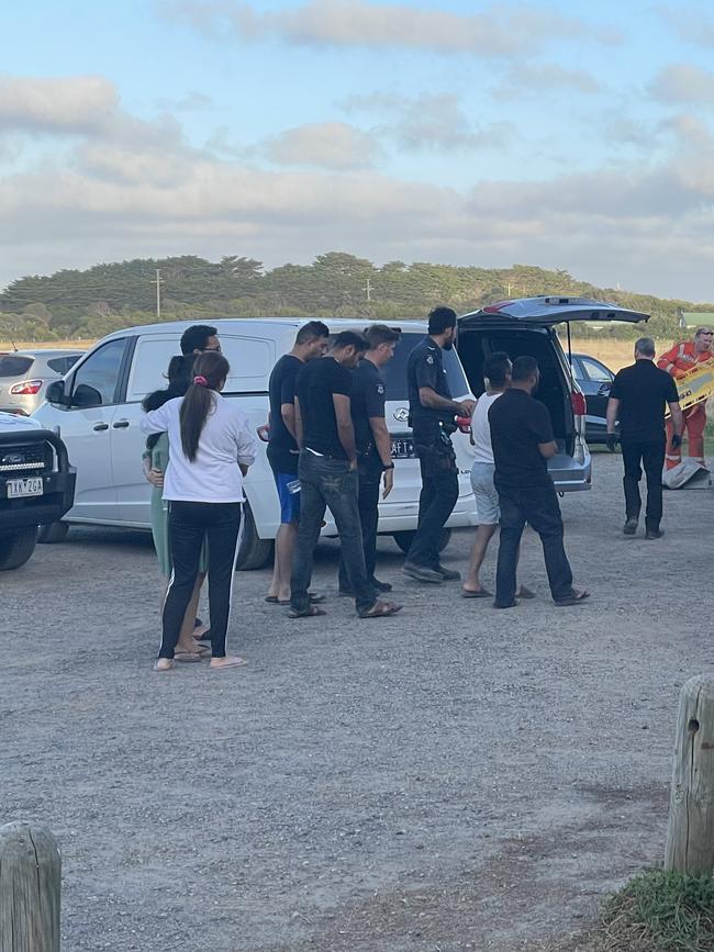 Onlookers at the scene of the Phillip Island drowning.