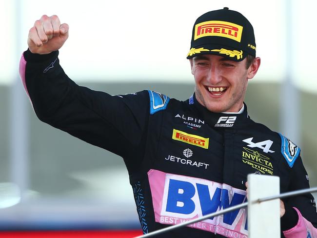 ABU DHABI, UNITED ARAB EMIRATES - NOVEMBER 26: Race winner Jack Doohan of Australia and Invicta Virtuosi Racing (14) celebrates on the podium during the Round 14 Yas Marina Feature race of the Formula 2 Championship at Yas Marina Circuit on November 26, 2023 in Abu Dhabi, United Arab Emirates. (Photo by Clive Rose/Getty Images)