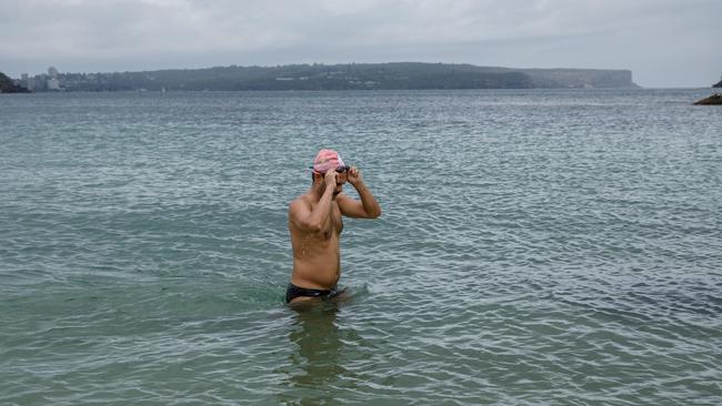 Regular ocean swimmer Kiran Aithala will still be taking his regular exercise in the salt water. Picture: Max Mason-Hubers