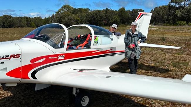 Lesleigh Griffin, 71, who had an emergency landing at Wynyard Airport with her twin sister Billie Hicks behind the tail of their plane. Picture: Supplied