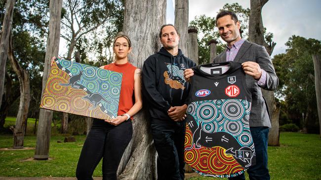 Aboriginal artist Elle Campbell, Aboriginal Programs Manager Braedon Talbot and Santos Aboriginal Power Cup ambassador Gavin Wanganeen. Picture: Tom Huntley