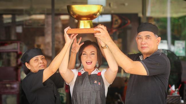 From L Vien Lu, Grace Murphy and Sonny Tran the winning team Chow, taking out the grand prize in the Darwin International Laksa Festival. Picture: Glenn Campbell