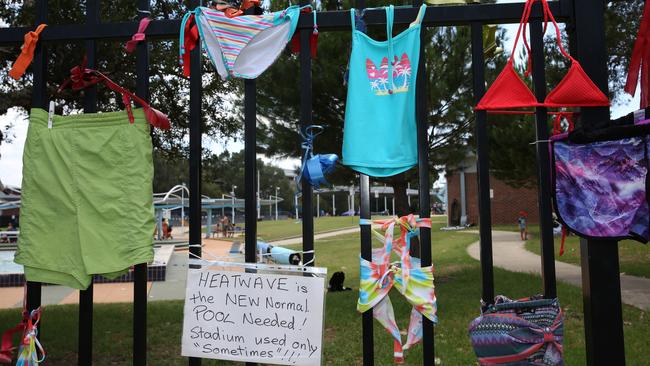 Swimmers staged a protest over the closure of the pool. Picture: Peter Kelly