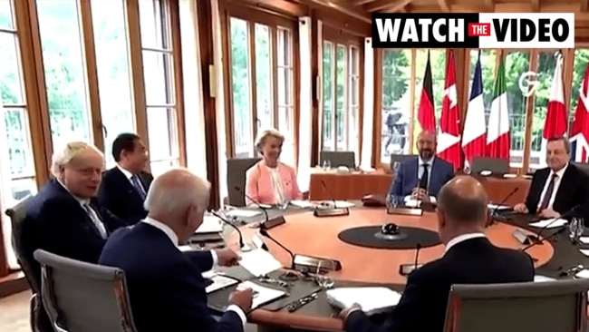 Boris Johnson seated next to Joe Biden at the G7 meeting.