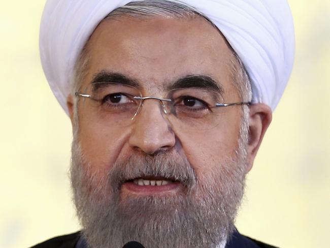 Iran's President Hassan Rouhani addresses the nation in a televised speech after a nuclear agreement was announced in Vienna, in Tehran, Iran, Tuesday, July 14, 2015. After long, fractious negotiations, world powers and Iran struck a historic deal Tuesday to curb Iran's nuclear program in exchange for billions of dollars in relief from international sanctions - an agreement aimed at averting the threat of a nuclear-armed Iran and another U.S. military intervention in the Middle East. (AP Photo/Ebrahim Noroozi)