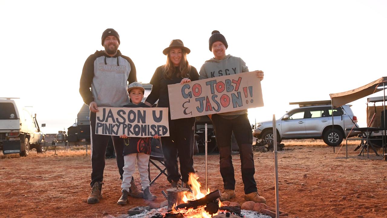 Finke fans Simon, Emmett, Nadine and Luke hope Toby Price and Jason beep their horn at the 20km mark after promising to do so at Friday nights scrutineering. Picture: (A)manda Parkinson