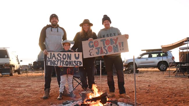 Finke fans Simon, Emmett, Nadine and Luke hope Toby Price and Jason beep their horn at the 20km mark after promising to do so at Friday nights scrutineering. Picture: (A)manda Parkinson