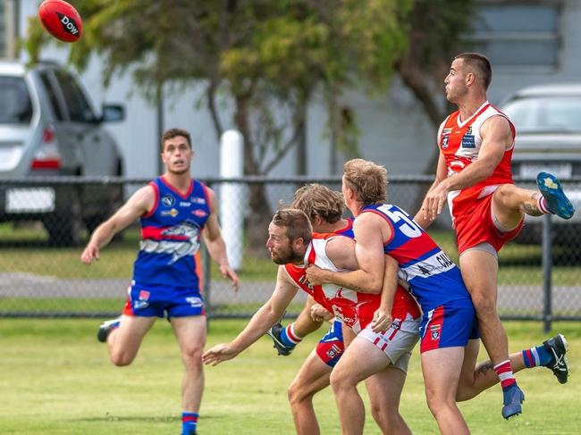 Myles Poholke (right) in action against Queenscliff. Picture: David Caspar