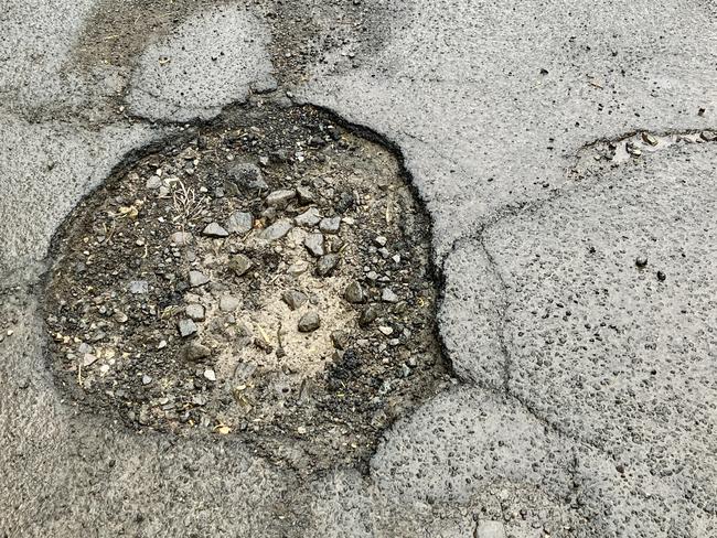 A pothole on Sanders Rd.