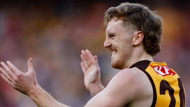 MELBOURNE, AUSTRALIA - AUGUST 20: Denver Grainger-Barras of the Hawks celebrates a goal during the 2023 AFL Round 23 match between the Melbourne Demons and the Hawthorn Hawks at Melbourne Cricket Ground on August 20, 2023 in Melbourne, Australia. (Photo by Dylan Burns/AFL Photos via Getty Images)