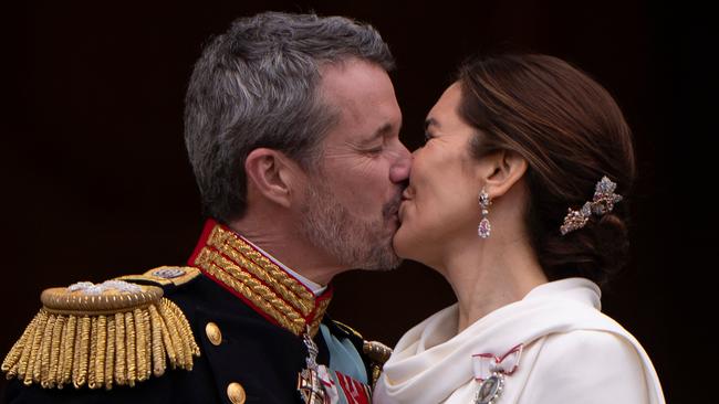 King Frederik X of Denmark kisses Queen Mary of Denmark on the balcony of Christiansborg Palace in Copenhagen after after a declaration on the accession to the throne by the Danish PM. Picture: AFP