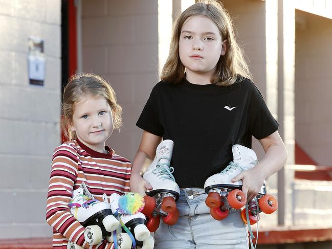 Caitlin Barclay, 7, and Cairah Cox, 11, pictured outside Stafford Skate Centre, Brisbane 19th of April 2021.  The skate centre is closing on September 12th after operating for 40 years.  (Image/Josh Woning)