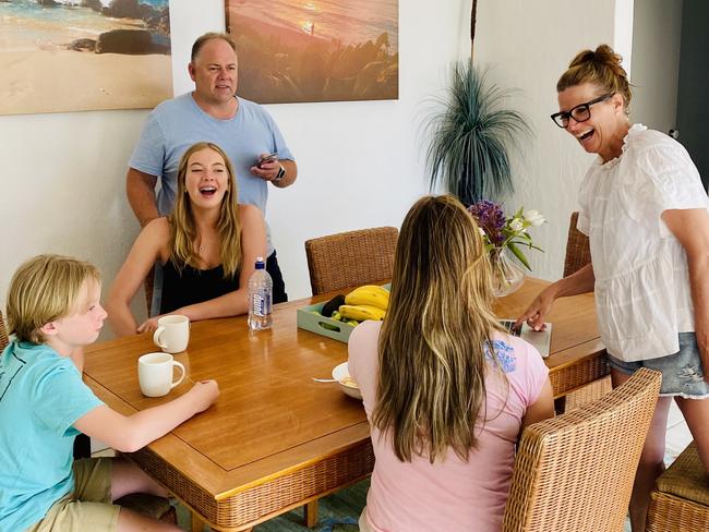 Paul and Elly Murray – with their children Finn, 11, Neve, 17, and Enna, 13 – use meal times for planning. Picture: Supplied